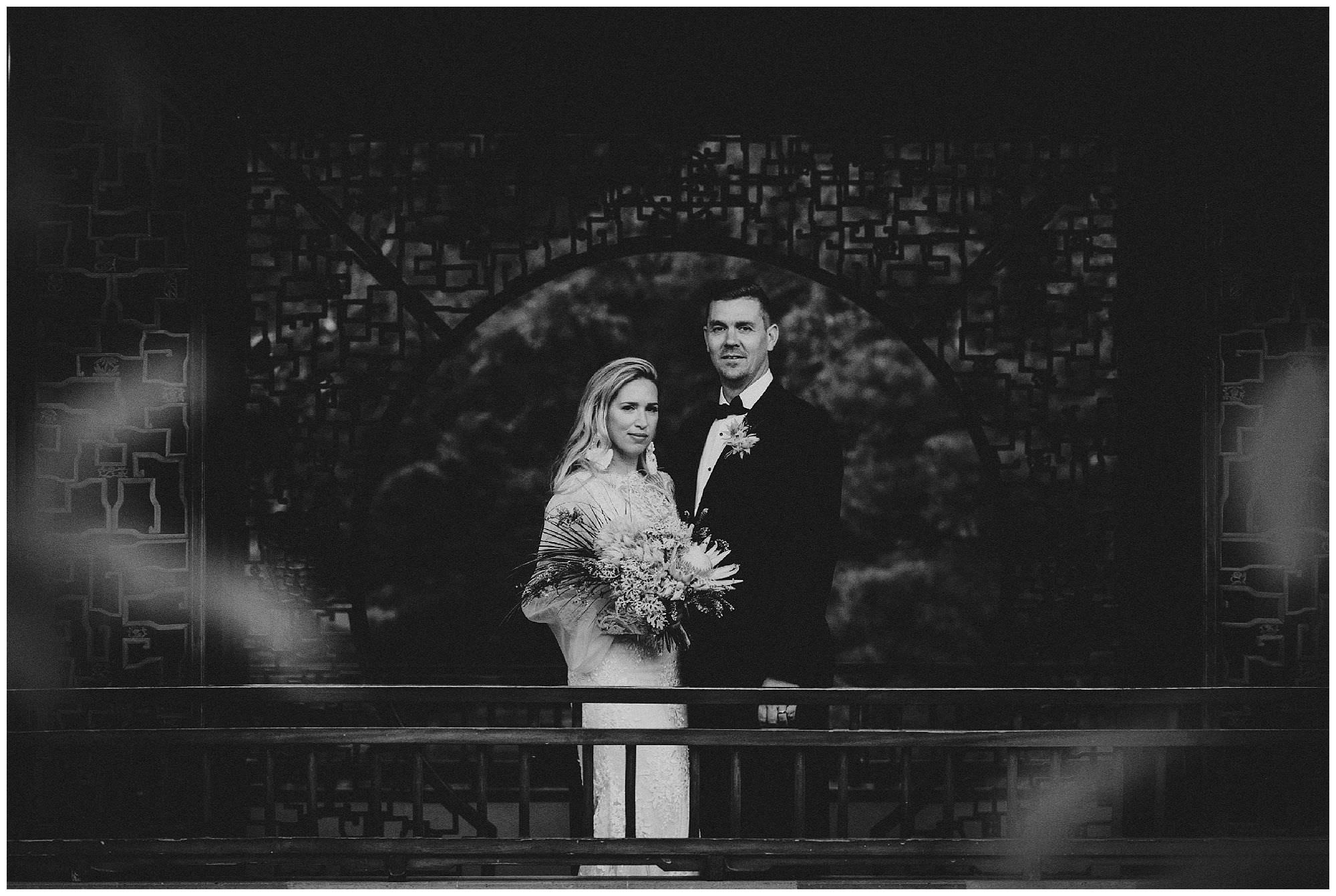 Bride and Groom at sunset after their wedding ceremony at Dr. Sun Yat-Sen Classical Chinese Gardens, elopement, intimate wedding, black and white wedding photography