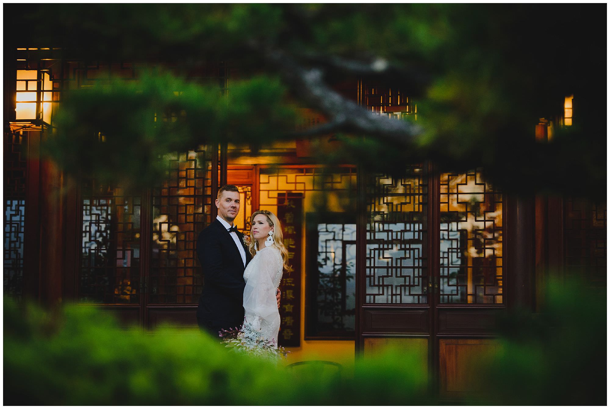 stylish bride and groom at sunset after their wedding ceremony at Dr. Sun Yat-Sen Classical Chinese Gardens, elopement, intimate wedding, candid wedding photography